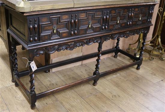 A Jacobean style oak dresser base W.137cm